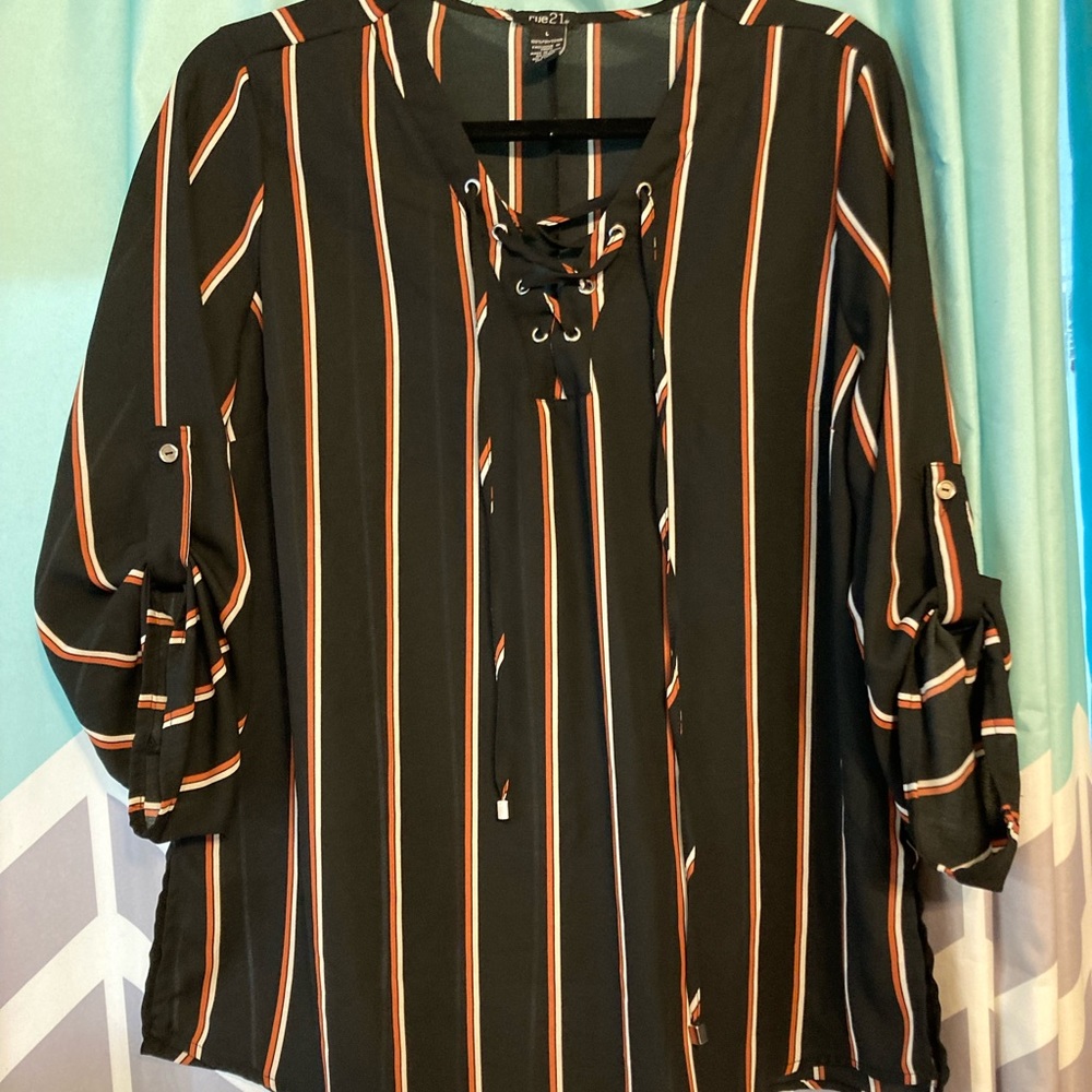 size large color dark orange white and black slits on the side